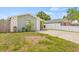 Charming single-story home with a well-maintained lawn and beautiful stone accents at 9112 Suffield Ct, Tampa, FL 33615