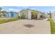 Charming single-story home with a well-maintained lawn and a spacious driveway at 9112 Suffield Ct, Tampa, FL 33615