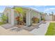 Charming home featuring a garden area with lush plants and a stone-accented wall, adding character to the property at 9112 Suffield Ct, Tampa, FL 33615