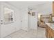 Hallway showing access to the front door and living area at 9112 Suffield Ct, Tampa, FL 33615
