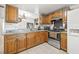 Spacious kitchen with light wood cabinets and stainless steel oven at 9112 Suffield Ct, Tampa, FL 33615