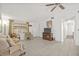 Bright living room with tile floors, large windows, and a neutral color palette, offering a relaxing atmosphere at 9112 Suffield Ct, Tampa, FL 33615