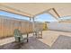 Relax on the brick patio under the awning, surrounded by a privacy fence at 9112 Suffield Ct, Tampa, FL 33615