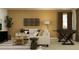 Comfortable living room with a white sofa, stylish decor, natural textures, and a warm color palette at 9616 Runaway Breeze Dr, Land O Lakes, FL 34637