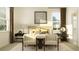 Serene main bedroom with neutral tones, natural light, and stylish furnishings, creating a relaxing retreat at 9616 Runaway Breeze Dr, Land O Lakes, FL 34637