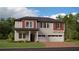 Two-story home showcasing a three-car garage, neutral stucco, and tasteful red-paneled accents at 9652 Runaway Breeze Dr, Land O Lakes, FL 34637