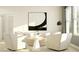 Bright living room with modern furnishings and large windows at 9652 Runaway Breeze Dr, Land O Lakes, FL 34637
