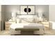 Serene main bedroom with a neutral color palette and modern decor, filled with natural light at 9652 Runaway Breeze Dr, Land O Lakes, FL 34637
