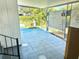 Enclosed patio with tiled floors perfect for outdoor entertaining and relaxing at 9790 66Th N St # 80, Pinellas Park, FL 33782