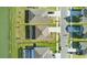 An aerial view of homes and their driveways from above at 9893 Branching Ship Trce, Wesley Chapel, FL 33545