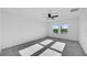 Bedroom featuring carpet, a ceiling fan, and windows that provide natural light and view of outside at 9893 Branching Ship Trce, Wesley Chapel, FL 33545