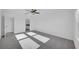 Bedroom featuring carpet, a ceiling fan, and access to an adjoining bathroom or closet at 9893 Branching Ship Trce, Wesley Chapel, FL 33545