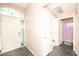 Inviting foyer leading to a bedroom and bathroom showcasing the home's interior at 10321 Ravines Dr, New Port Richey, FL 34654