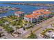 Stunning aerial view of waterfront condos with private docks, lush landscaping and stunning water views at 1042 Bellasol Way # 202, Apollo Beach, FL 33572