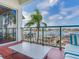 Comfortable balcony view overlooking the boat docks on a sunny day at 1042 Bellasol Way # 202, Apollo Beach, FL 33572