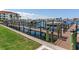 Wide angle of a waterfront dock with multiple boat slips and parking at 1042 Bellasol Way # 202, Apollo Beach, FL 33572