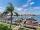 Picturesque waterfront view of a dock with multiple boat slips on a sunny day at 1042 Bellasol Way # 202, Apollo Beach, FL 33572