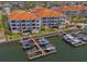 Beautiful condo buildings boasting terracotta roofs with community boat docks at 1042 Bellasol Way # 202, Apollo Beach, FL 33572