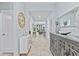 Spacious foyer showcases tile floors, decorative furnishings, and view of open layout at 10514 Scenic Hollow Dr, Riverview, FL 33578