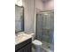 Modern bathroom featuring a walk-in shower with decorative tile and fixtures at 10712 Oak Bend Dr, Parrish, FL 34219