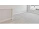 Bright bedroom featuring plush carpet and natural light from a large window at 10712 Oak Bend Dr, Parrish, FL 34219