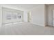 Spacious bedroom with plush carpet, ample natural light, and neutral walls at 10712 Oak Bend Dr, Parrish, FL 34219