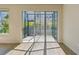 Relaxing screened patio providing a seamless transition between indoor and outdoor living at 10712 Oak Bend Dr, Parrish, FL 34219