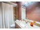 Bathroom featuring a shower/tub combo and single vanity sink at 11296 Warm Wind Way, Weeki Wachee, FL 34613