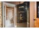Fort Knox safe in a room with an adjacent bathroom with tile floors and vanity at 11296 Warm Wind Way, Weeki Wachee, FL 34613