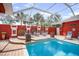 Beautiful in-ground pool with decorative features offers a luxurious and relaxing outdoor oasis at 11296 Warm Wind Way, Weeki Wachee, FL 34613