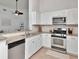 Modern kitchen with granite countertops and stainless steel appliances at 12327 Glenfield Ave, Tampa, FL 33626