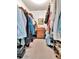 Spacious walk-in closet with ample storage and organization at 12327 Glenfield Ave, Tampa, FL 33626