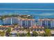 Breathtaking aerial view of the beachfront condo community with stunning ocean views and lush landscaping at 1325 Snell Isle Ne Blvd # 911, St Petersburg, FL 33704