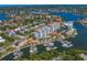 Aerial view of waterfront condo community with marina, pool, and landscaped grounds at 1325 Snell Isle Ne Blvd # 911, St Petersburg, FL 33704