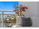 Cozy balcony with comfortable seating and vibrant flower decor, overlooking a beautiful view at 1325 Snell Isle Ne Blvd # 911, St Petersburg, FL 33704