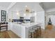 Bright, modern kitchen with stainless appliances and white cabinets including barstool seating at 1325 Snell Isle Ne Blvd # 911, St Petersburg, FL 33704