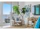 Stylish living room featuring comfortable seating, decor, and a view of the bay at 1325 Snell Isle Ne Blvd # 911, St Petersburg, FL 33704
