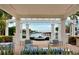 Scenic outdoor patio featuring comfortable seating and stunning waterfront views at 1325 Snell Isle Ne Blvd # 911, St Petersburg, FL 33704