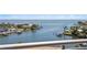 Stunning waterfront view showcasing the calm bay and waterfront homes from a condo balcony at 1325 Snell Isle Ne Blvd # 911, St Petersburg, FL 33704