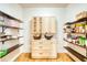 Well-organized pantry with custom shelving, cabinets, and countertop space at 13483 Heritage Way, Sarasota, FL 34240