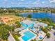 High angle view featuring a lakeside community with a baseball field, pool, splashpad, and other recreational facilities at 1390 S Hillcrest Ave, Clearwater, FL 33756