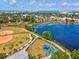 Aerial of community area with lake, baseball field, and playground, blending recreation with natural beauty at 1390 S Hillcrest Ave, Clearwater, FL 33756