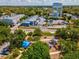 Aerial view featuring a water tower, industrial buildings, and nearby playground, balancing community and commerce at 1390 S Hillcrest Ave, Clearwater, FL 33756
