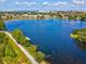 Beautiful aerial view of a lake community with walking path and scenic views at 1390 S Hillcrest Ave, Clearwater, FL 33756