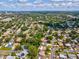 Scenic aerial view showcasing a community with nearby water views and sprawling greenery at 1390 S Hillcrest Ave, Clearwater, FL 33756