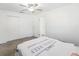 Bedroom with closet, ceiling fan, and large windows at 1390 S Hillcrest Ave, Clearwater, FL 33756