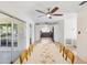 Bright dining room with views of the kitchen, access to the patio, and space for entertaining at 1390 S Hillcrest Ave, Clearwater, FL 33756