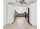 Well-lit kitchen featuring two-tone cabinets, updated appliances, and ample counter space at 1390 S Hillcrest Ave, Clearwater, FL 33756