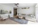 Bright and airy living room with comfortable seating, stylish decor, and view into kitchen at 1390 S Hillcrest Ave, Clearwater, FL 33756