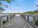 A wooden pier offers stunning water views in a waterfront community recreational area with a great view at 1390 S Hillcrest Ave, Clearwater, FL 33756